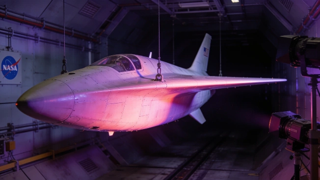 NASA Wing Glows Under Ultraviolet Light in Airflow Test Science.Report